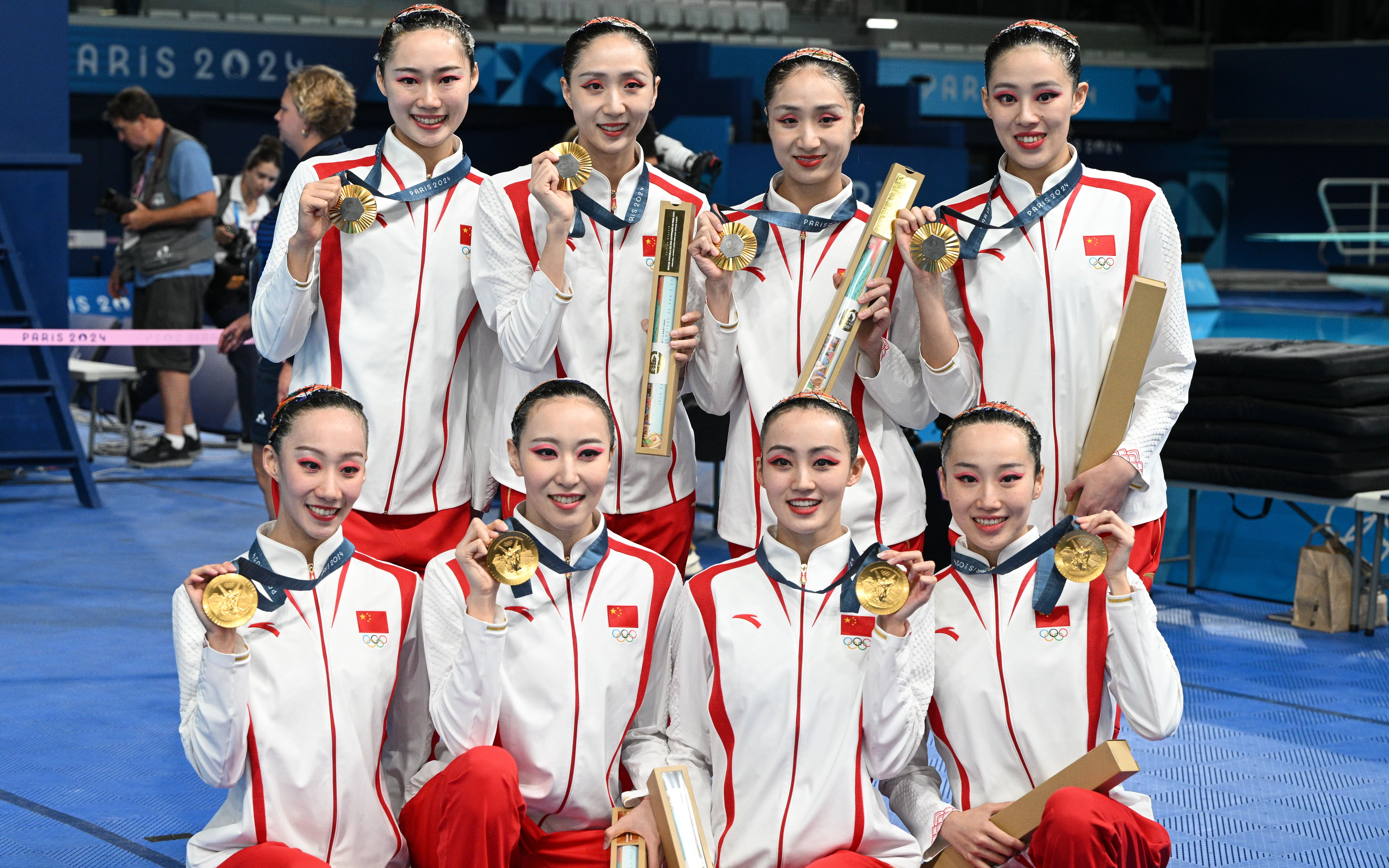 花游队展现完美协作,摘得金牌 花游队展现完美协作,摘得金牌